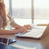 Woman at home on laptop in a stress-free environment taking an exam