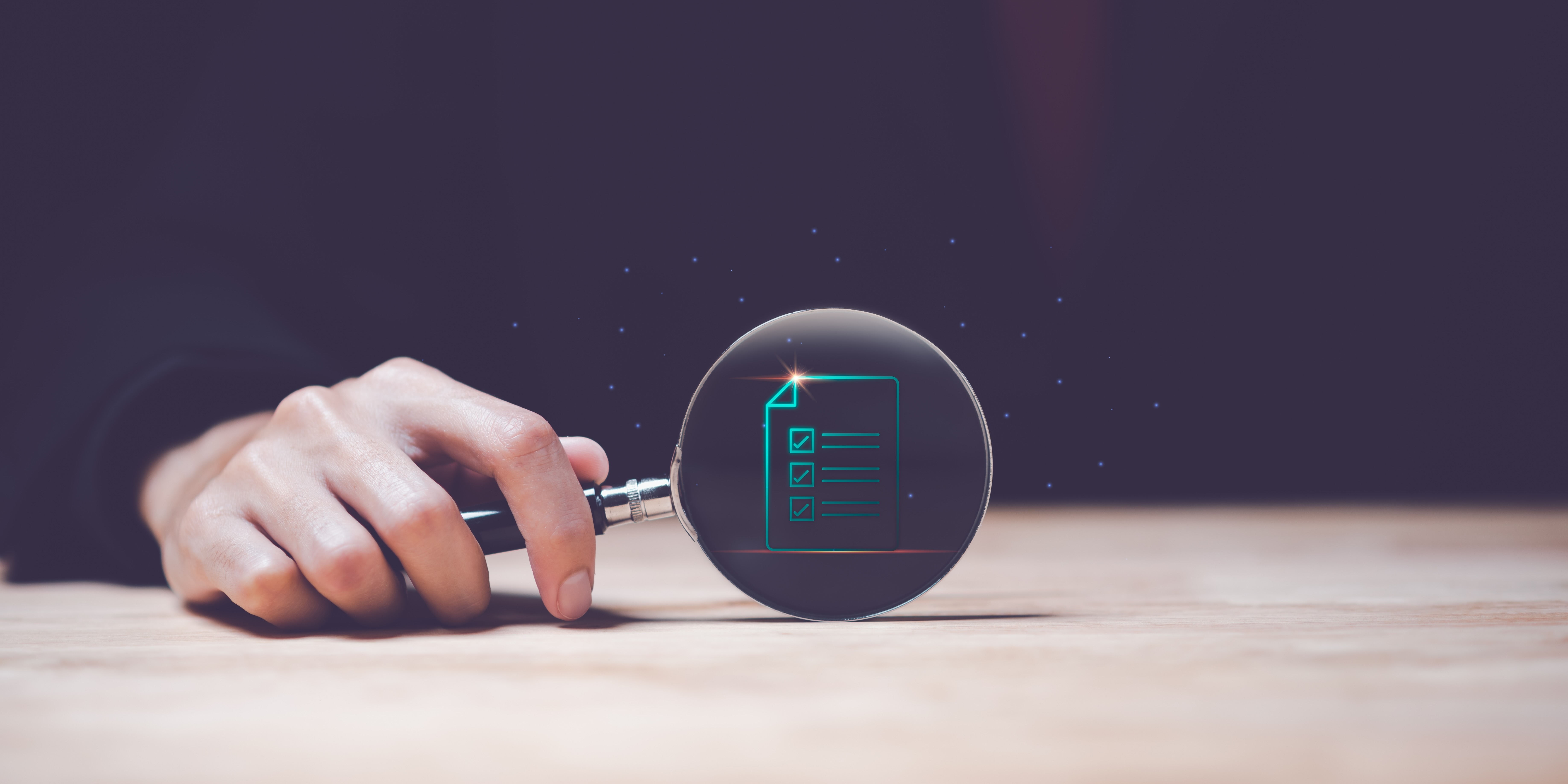 Money stacking up on a table to illustrate the work of the Pensions Management Institute, who use TestReach for online examination delivery.