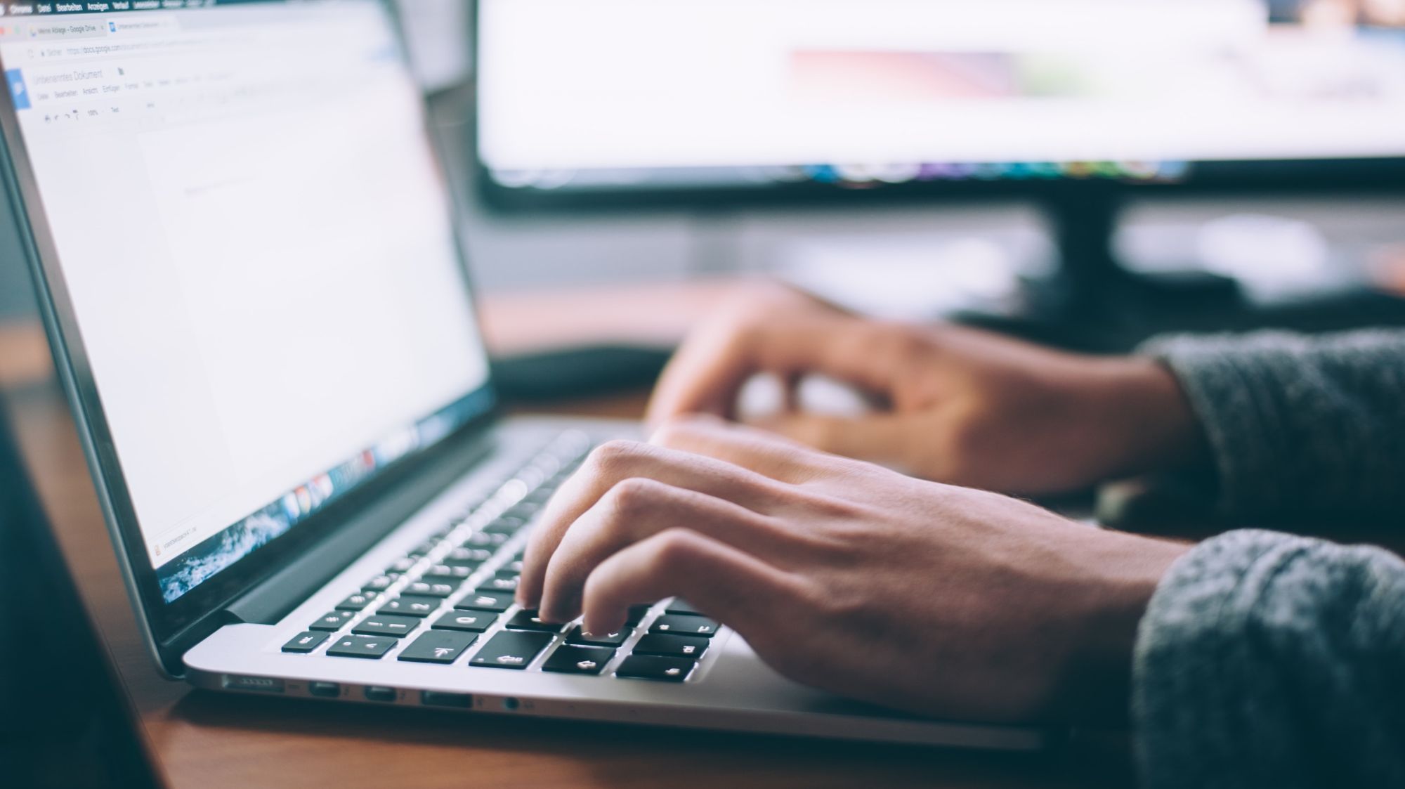 Person at computer using a remote assessment solution