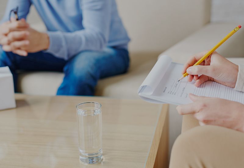 Man getting therapy from a trained professional