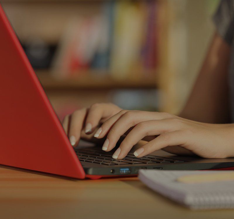 Accountant using laptop to sit an exam