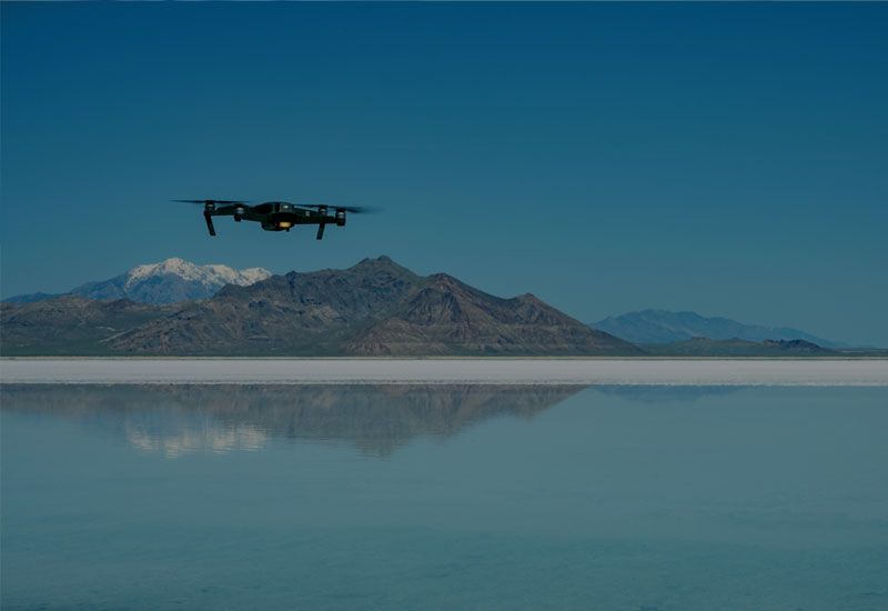 Aerial footage of a drone flying over mountains